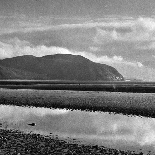 Still and quiet with the mountains beyond: Still and quiet with the mountains beyond