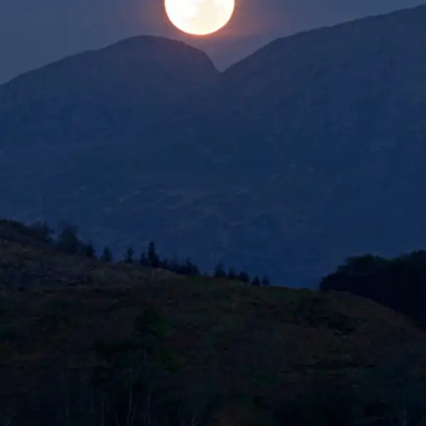 The moon sets